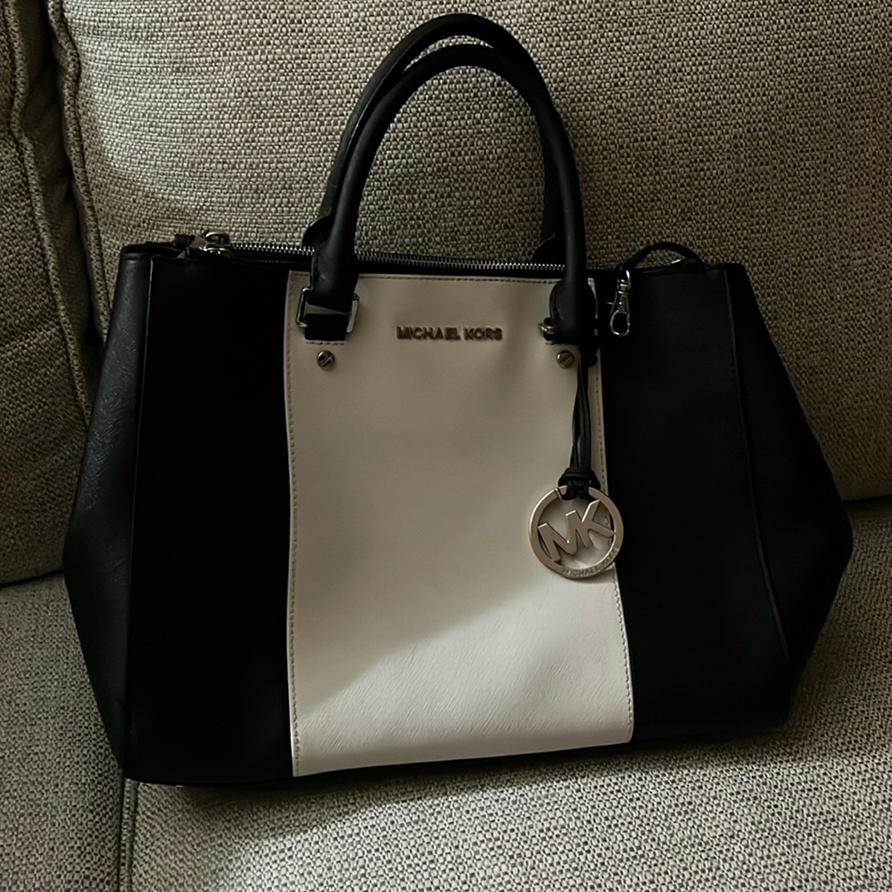 Black and white Michael Kors purse